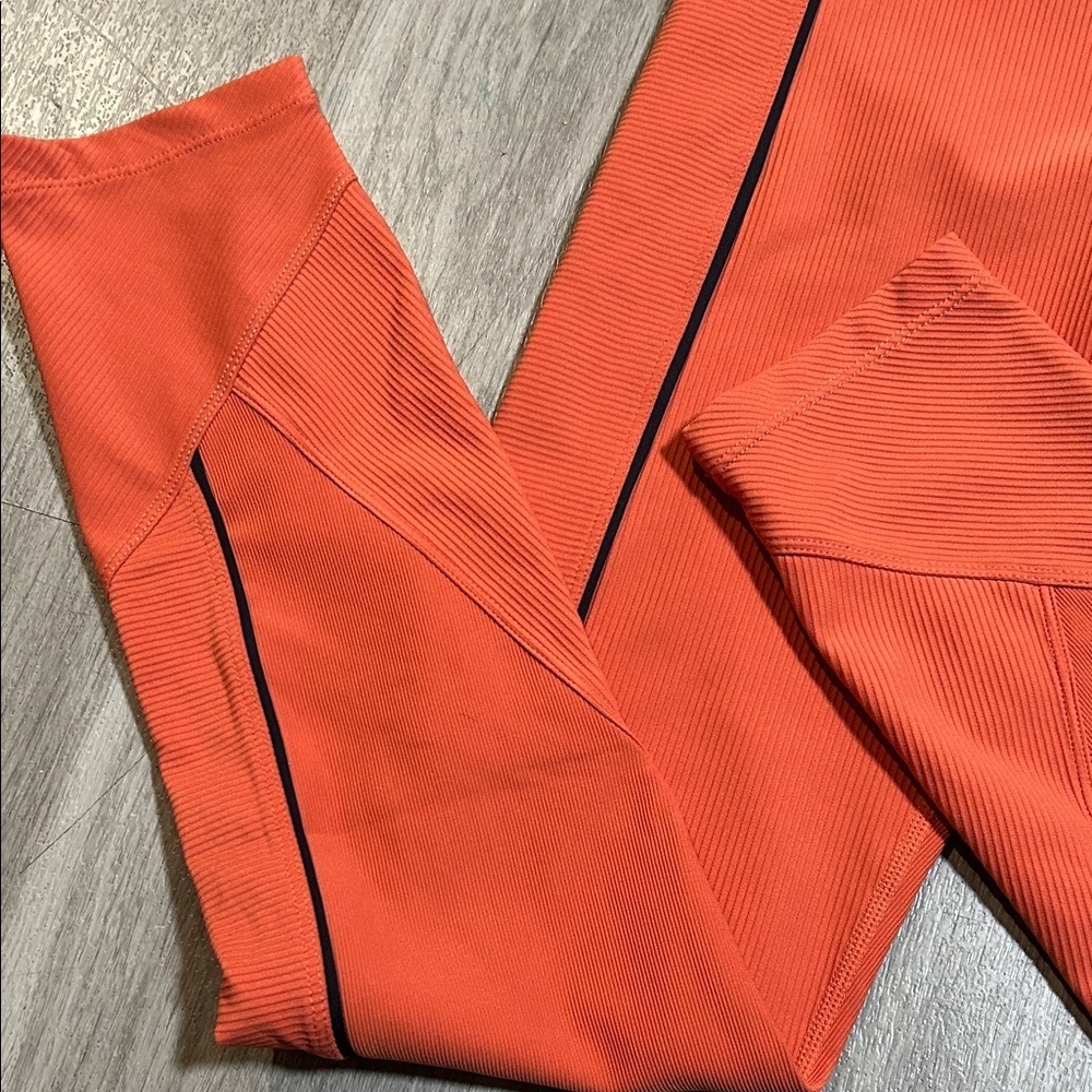 Stylish Orange Leggings with Black Trim - Picture 2 of 10